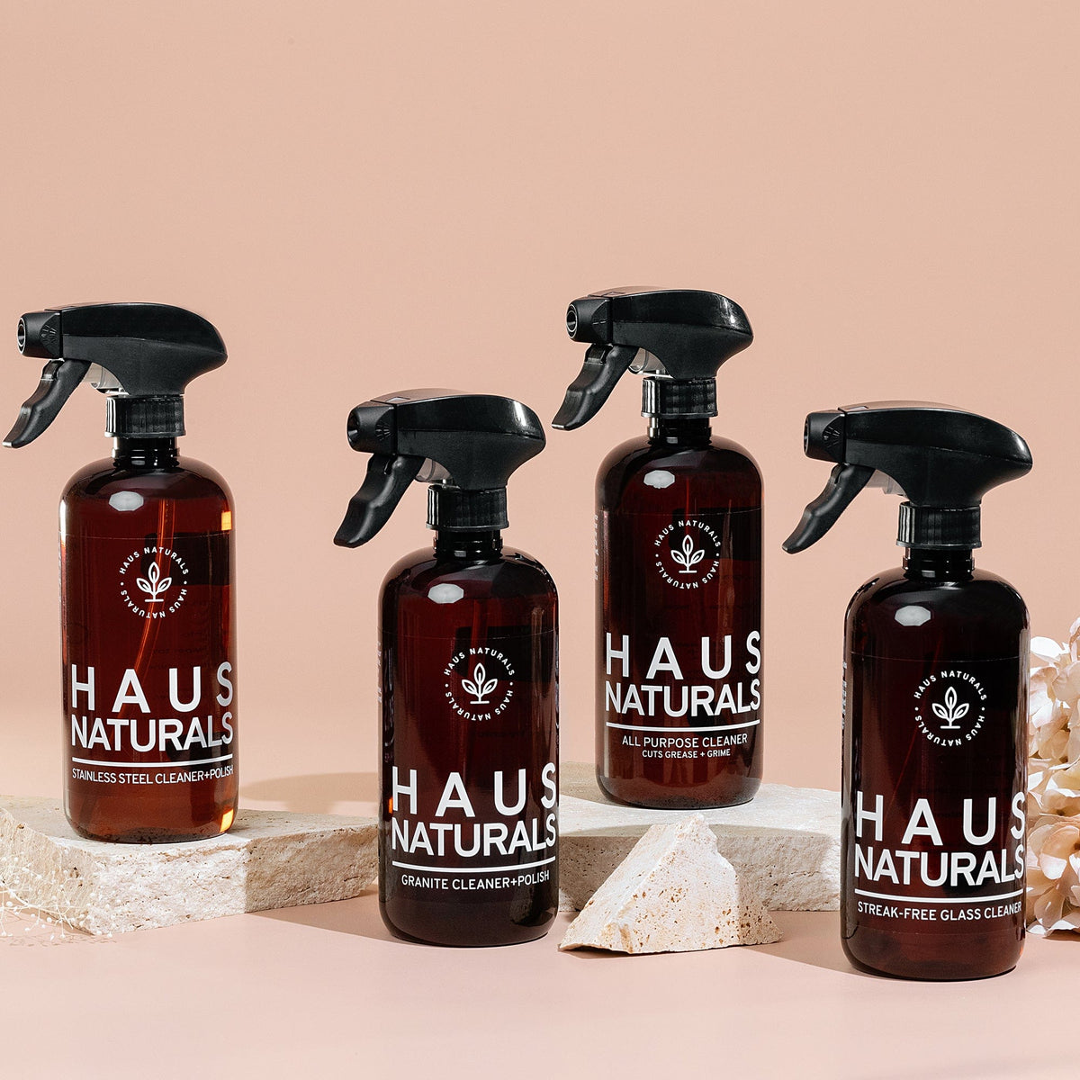 Haus Naturals Granite Cleaner & Polish in its current amber bottle